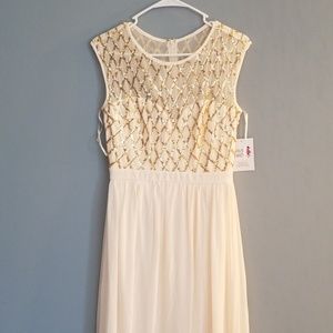 Never worn formal gown with slit